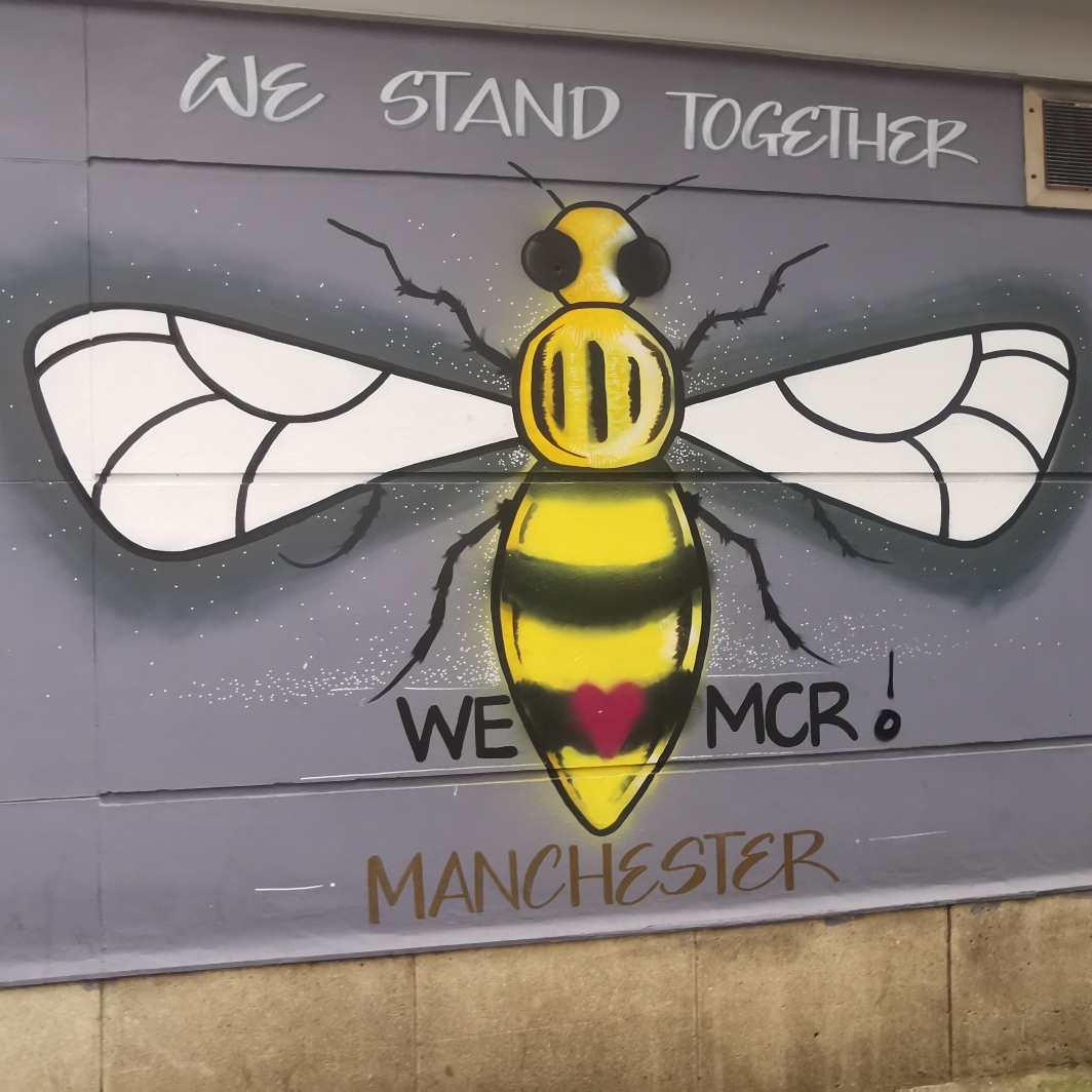 Bee mural corner of Booth Street and West Mosley Street
