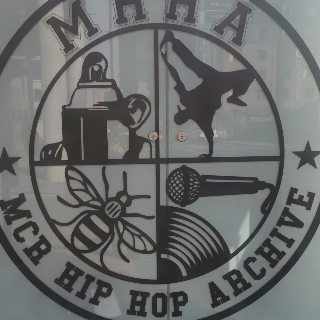 Manchester Bee on Manchester Hip Hop Archive logo on New Quay Street