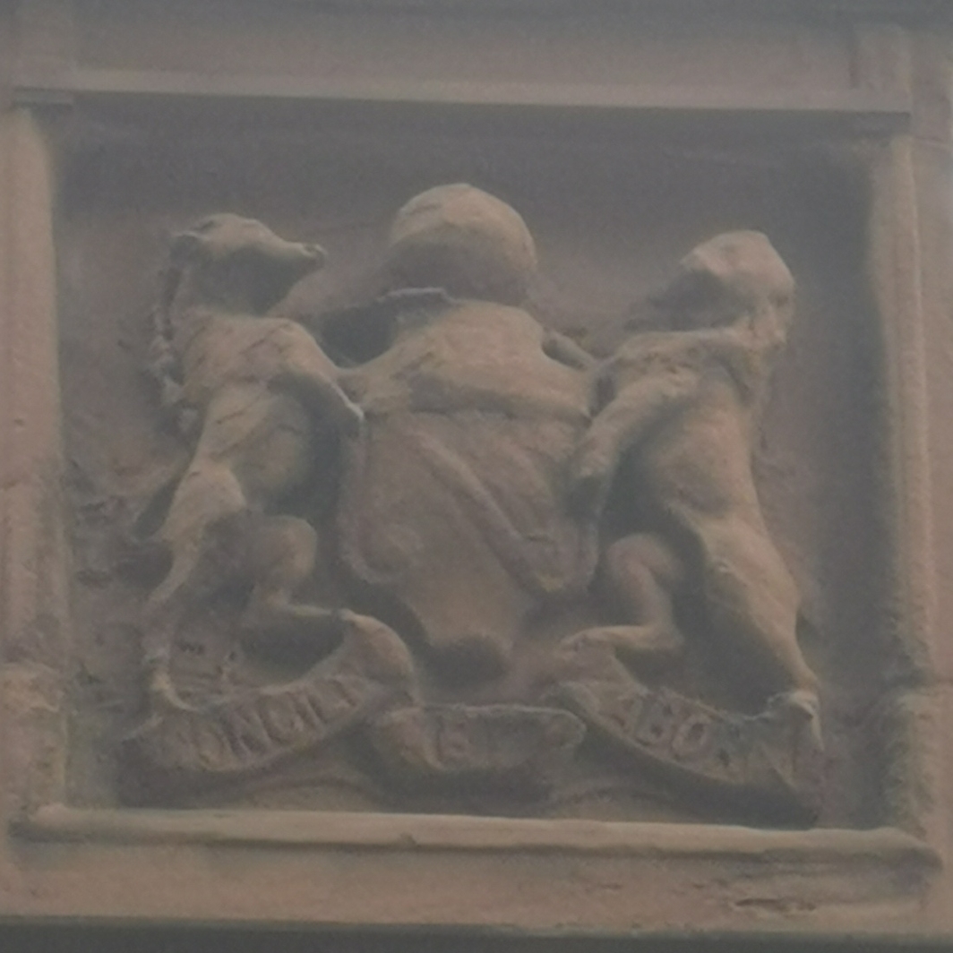 Manchester Coat of Arms on building at 140 Deansgate, bees may have flown off