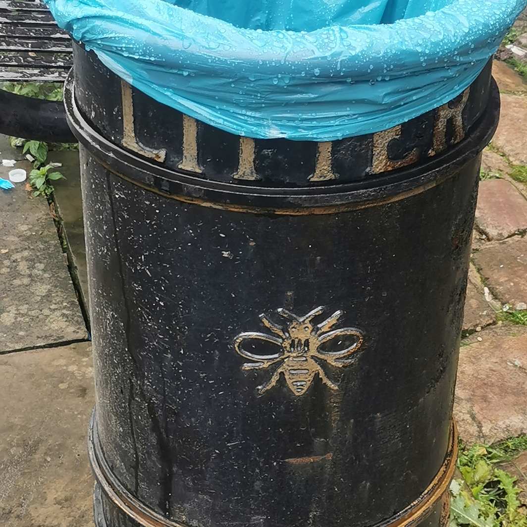 Manchester bee on old style bin at Lock 87, Canal Street