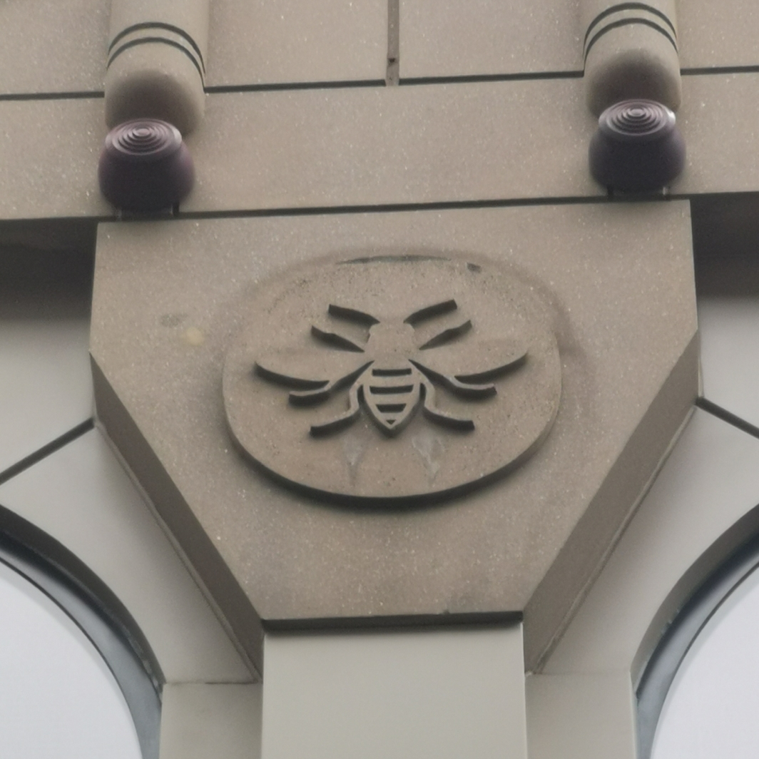 Bee on building, Exchange Street / St. Annes Square