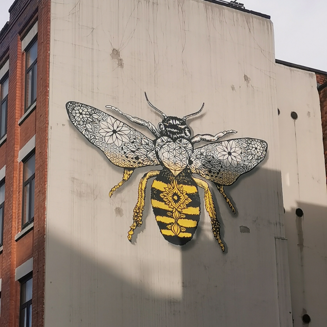 Bee mural on building, Houndsworth Street