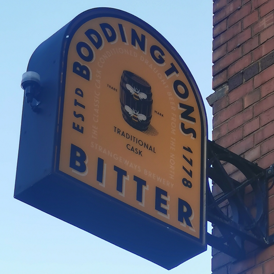 Bees on Boddingtons sign at the Black Friar pub, Blackfriars Road, Salford