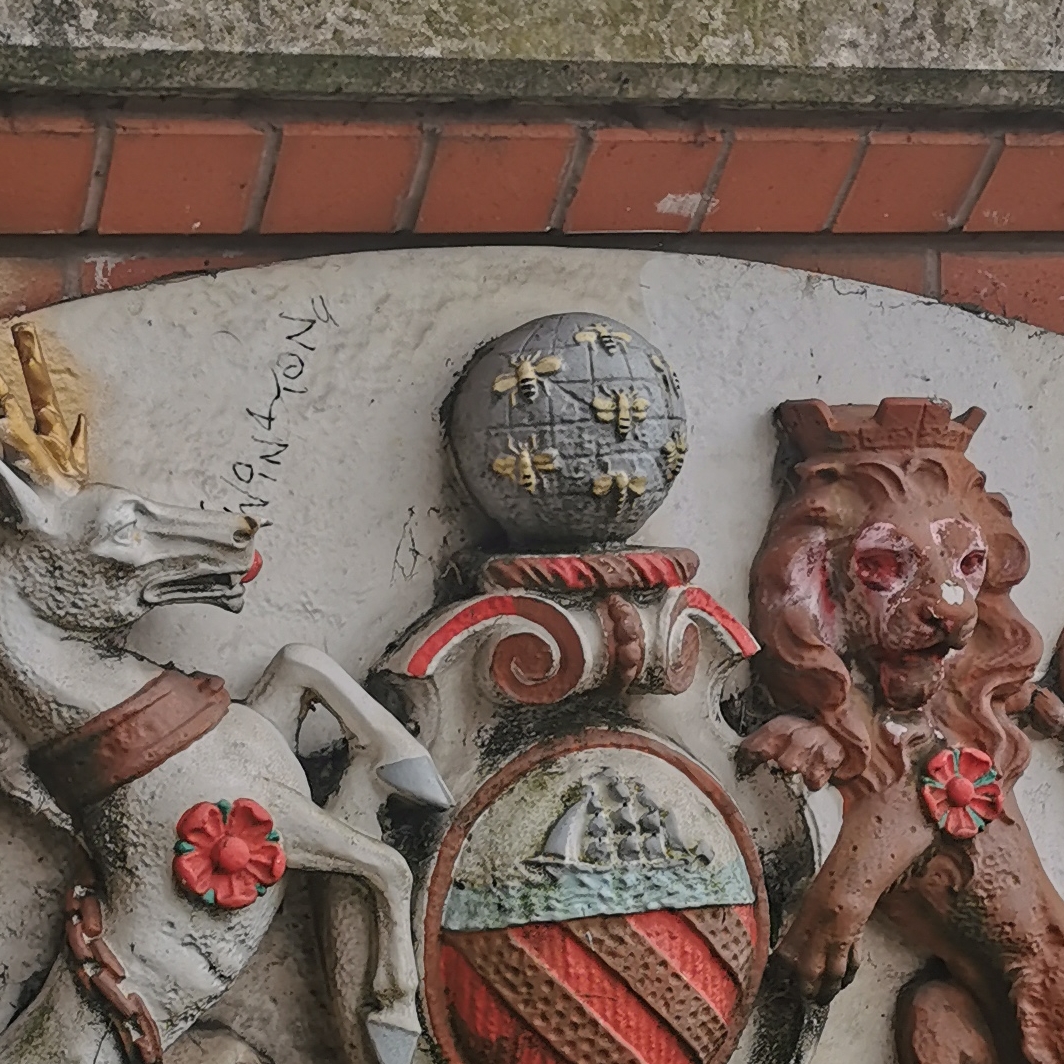 Close up of bees on Manchester coat of Arms on Edgerton Street bridge over the Bridgewater Canal