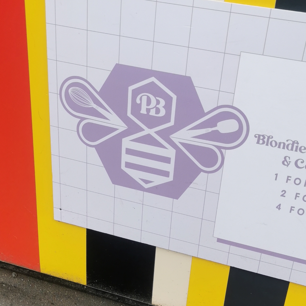 Bee in sign at Piccadilly Gardens food market