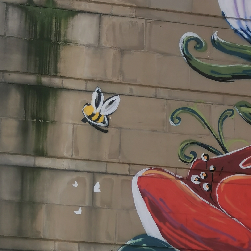 Bee on mural at Great Northern Square, Deansgate