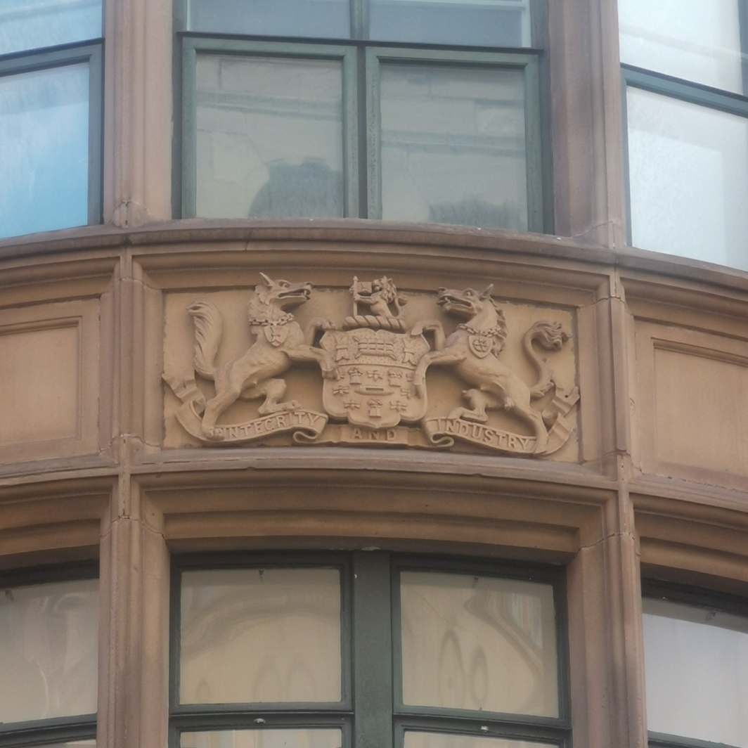 Bees on Salford coat of arms Portland House, Princess Street