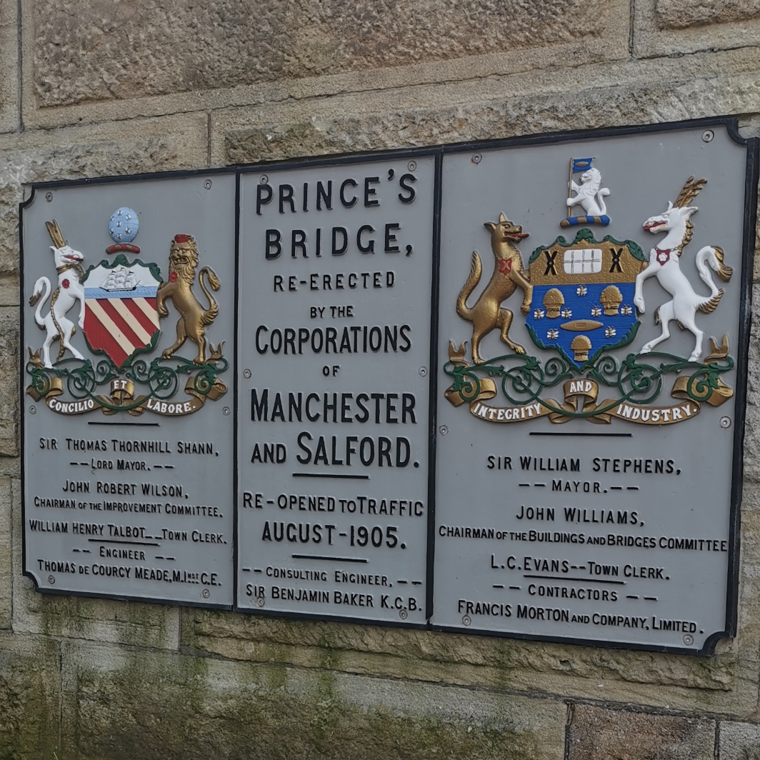 Bees on Manchester and Salford coats of arms on Prince's Bridge plaque, now Ordsall Chord footbridge