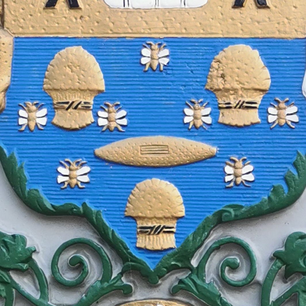 Close up of bees on Salford coat of arms on Prince's Bridge plaque, now Ordsall Chord footbridge